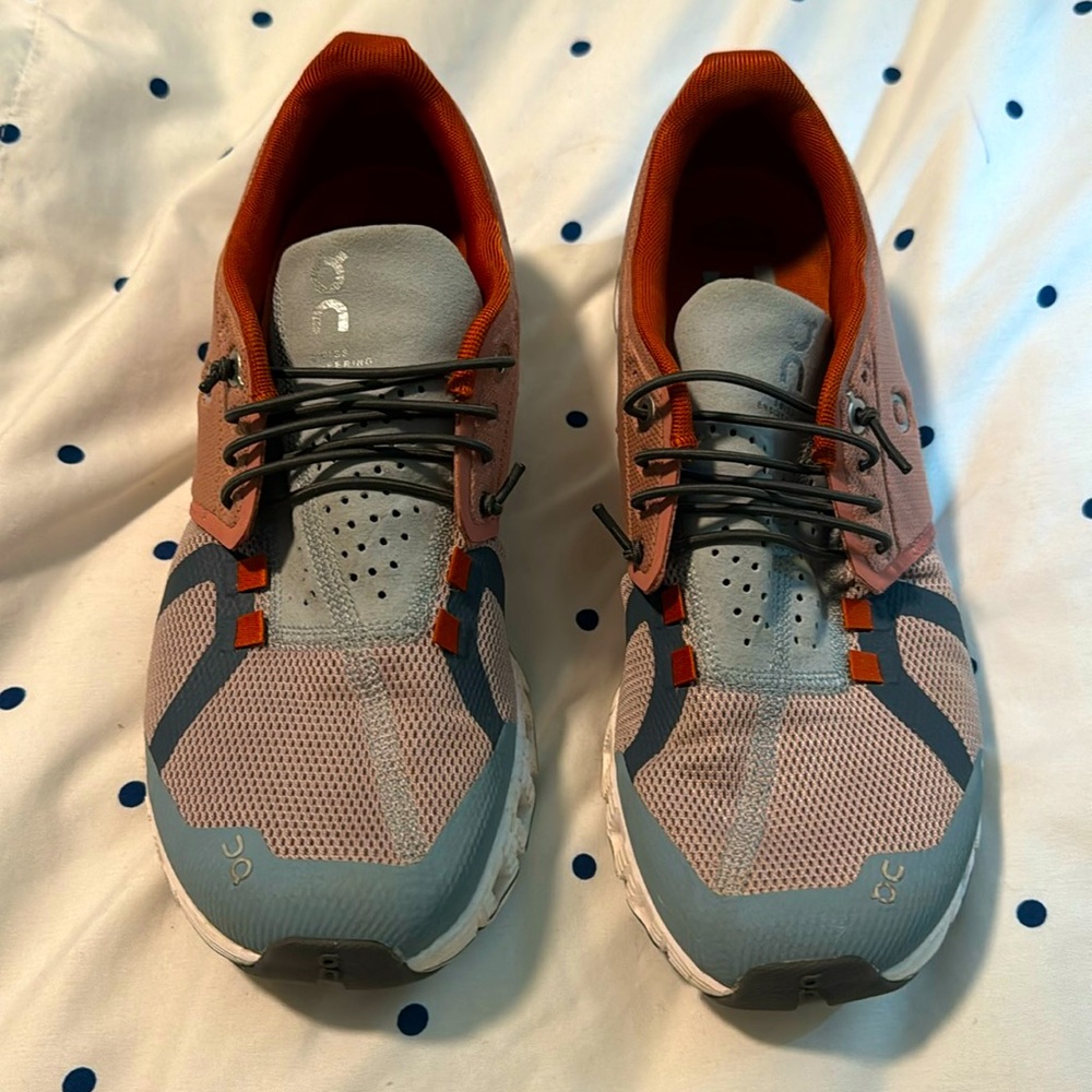 On running slip on quick lace shoe. Blue and a rust. Size 8. Great condition!!